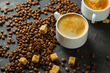 coffee fresh and hot in a white cup, aroma. serving of beverage (coffee grain). food. top view. copy space