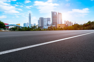 Road and skyline of urban architecture..