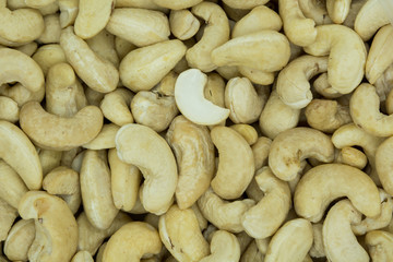 Roasted cashew nuts. Texture of nuts. Top view.