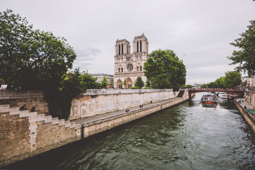 Fototapeta na wymiar Notre dame cathedral from river Seine in Paris. Notre dame cathedral from river Seine Paris, France