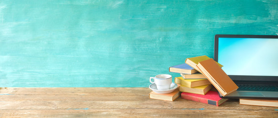 heap of books,cup of coffee and laptop, learning, education, panorama, copy space