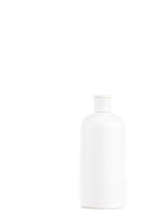 White cosmetic bottle with cap isolated on white