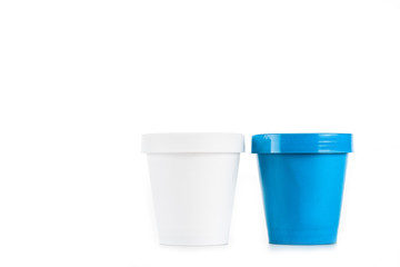 White and blue plastic cups isolated on white