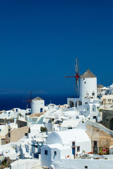 Fototapeta premium Santorini landscape against blue sky. Island for honeymoon