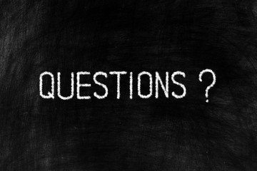 Questions in Chalk Writing on Old Grunge Chalkboard Background, Suitable for Education and Business...