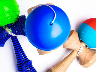colorful Kendama japanese toys, isolated on white, competition concept