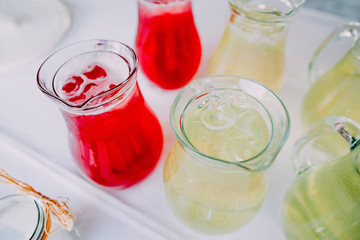 Many glasses with lemonade