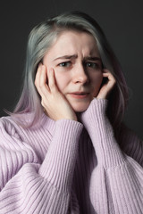 Portrait of the scared young woman