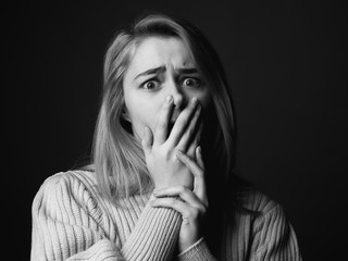 Scared young woman. Black and white