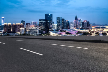 Road and skyline of urban architecture..
