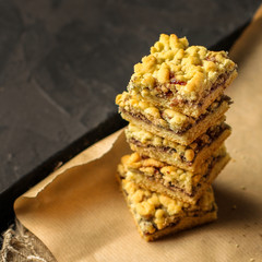 homemade cake with jam and streysel, pastry crumb. Delicious dessert. food background. top