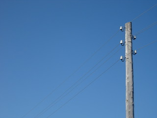 Obraz premium sky, pole, electricity, power, electric, wire, blue, energy, cable, line, voltage, electrical, technology, wires, tower, high, industry, lines, light, transmission, telephone, pylon, communication, te