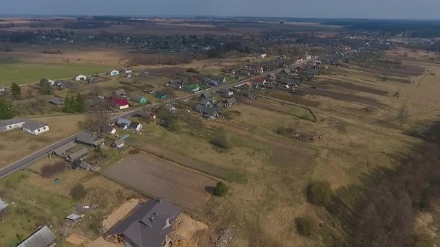 Village houses in the spring, Vishnevo Belarus. Shot by drone