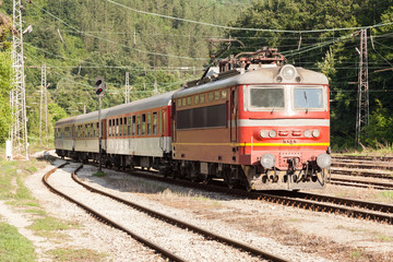 Fototapeta premium A passenger train arrives at the station