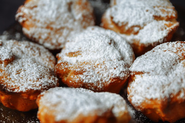 Delicious sweet homemade freshly baked cupcakes, Cupcakes with selective focus, on a gray background