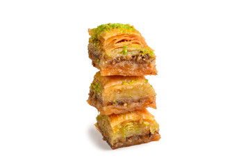 Pistachio baklava on a white background. Dessert.