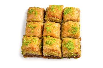 Pistachio baklava on a white background. Dessert.