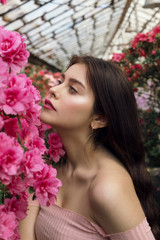 Fototapeta premium Young beautiful girl princess with healthy skin red lips and bare shoulders