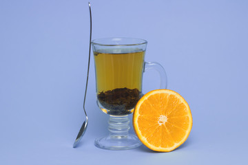 Orange tea still life on background
