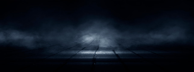 Dark street, night smog and smoke. Dark background of the night city, ray of light in the dark....