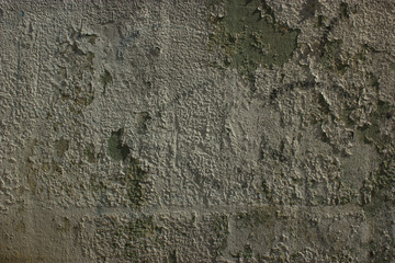 Surface of an old wall with peeling paint for background or texture