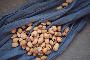 Useful nuts on a blue napkin.Food ingredient.