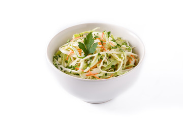 Coleslaw salad in white bowl isolated on white background