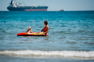 Summer time on beach and people. 