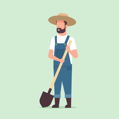 gardener holding shovel country man working in garden gardening eco farming concept full length