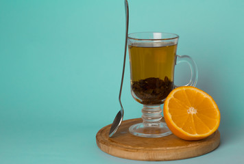 Orange tea still life on background