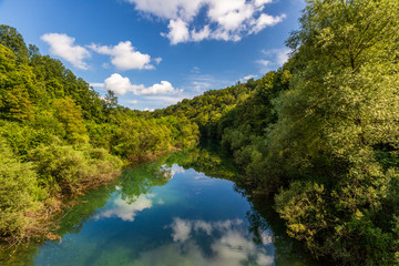 Fototapeta na wymiar Beautiful landscape with river, forest and reflection
