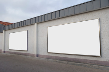 Blank billboards in a wall