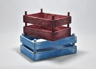 Handmade wooden crates in various colours