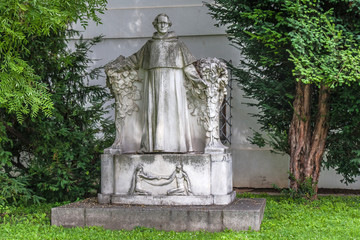 Statue of Gregor Mendel in the garden at the Mendelianum, the Mendel Museum, Brno. - obrazy, fototapety, plakaty