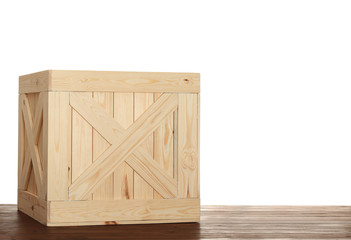 Wooden crate on table against white background. Space for text