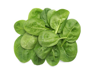 Pile of fresh spinach leaves isolated on white, top view