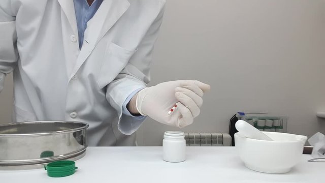Manufacture of capsules in a pharmacy prescription laboratory
