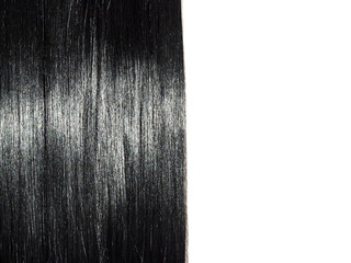 Shiny straight black hair background. Beautiful smooth brunette hair backdrop