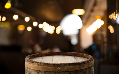 blurred background of bar and dark brown desk space of retro wood