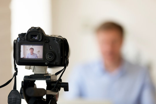 Shooting Video Or Making Photo Using Camera On Tripod