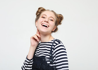 Portrait of beautiful cheerful girl smiling laughing looking at camera 