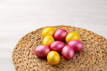 Easter background with Easter eggs. Top view with copy space.