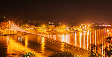Fototapeta premium Laxman Jula, Ram Jhula at night in Rishikesh India, India Tourism 