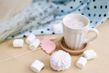 Fresh strawberry smoothie  with marshmallows, close-up. Easter concept. Creative spring flatlay, top view