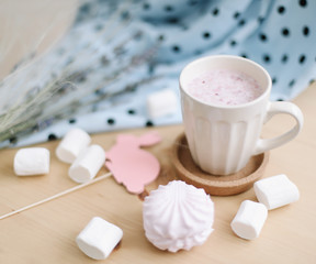Fresh strawberry milkshake with marshmallows, close-up. Easter concept for blog or recipe book. Creative spring flatlay, top view