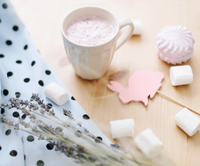 Fresh strawberry smoothie or milkshake with marshmallows, close-up. Easter concept. Creative spring flatlay, top view