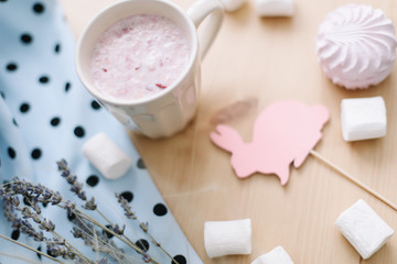 Fresh strawberry smoothie or milkshake with marshmallows, close-up. Easter concept. Creative spring flatlay, top view. Concept for blog or recipe book 