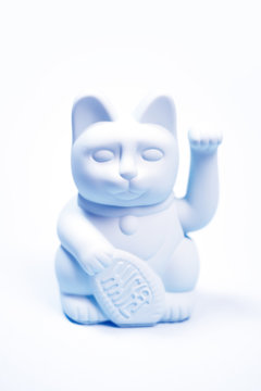 Japanese Lucky Cat On White Background