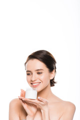 pretty girl holding container with cosmetic cream and smiling isolated on white