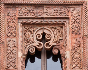 terra cotta facade in renaissance style with elaborate decorations